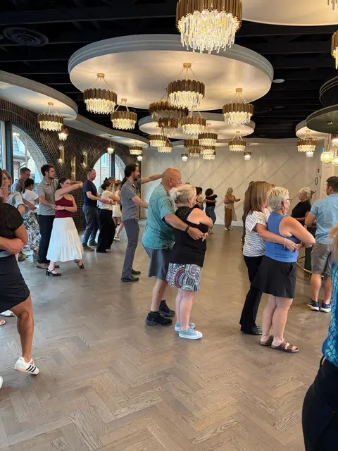 The class working through the cuddle position across the floor at Tuesday Salsa Nights, Chilliwack