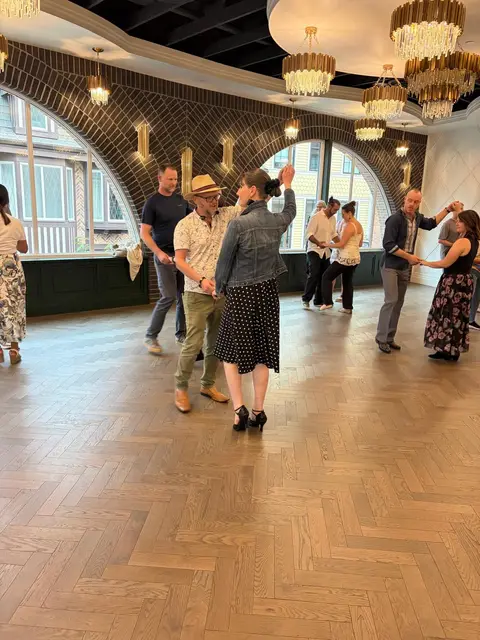 Salsa Paul instructing the follow’s right hand turn at Tuesday Salsa Nights, The Grand Hall, District 1881
