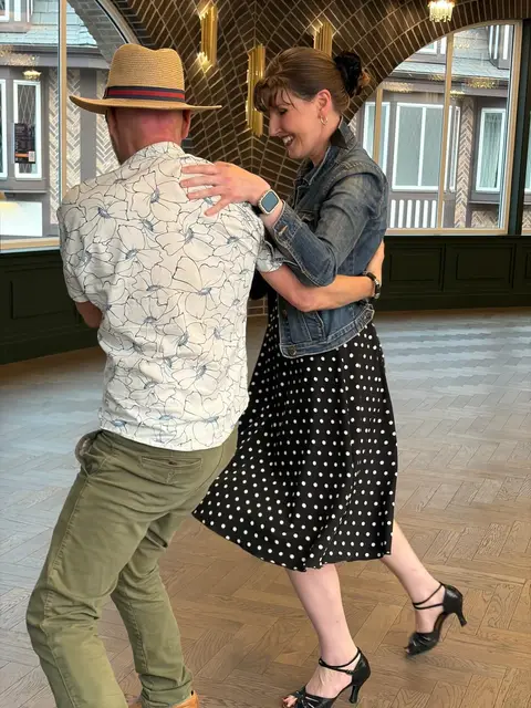 Laughing through a close-hold turn at Tuesday Salsa Nights, The Grand Hall, District 1881, Chilliwack
