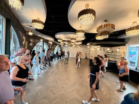 Rotating to a new partner during the beginner salsa lesson at The Grand Hall, Chilliwack BC