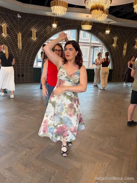 A dancer coming out of a turn at Tuesday Salsa Nights, The Grand Hall, District 1881