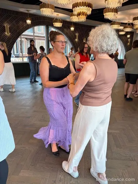 Two dancers practising close hold at Tuesday Salsa Nights, The Grand Hall, Chilliwack