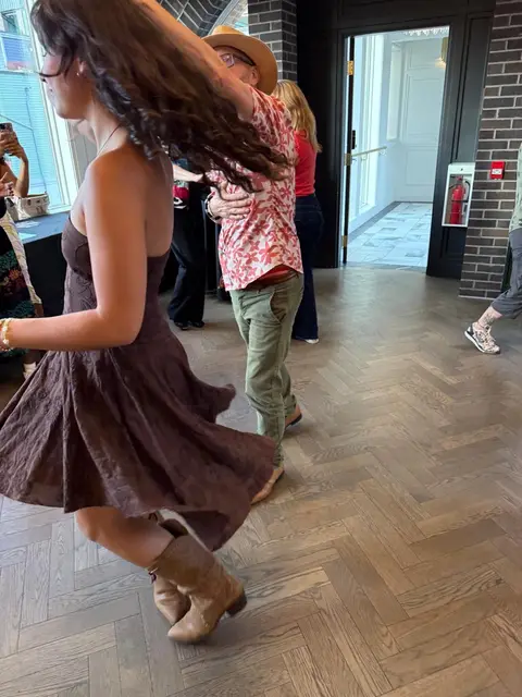 A skirt flaring mid-spin on the salsa floor at Tuesday Salsa Nights, District 1881