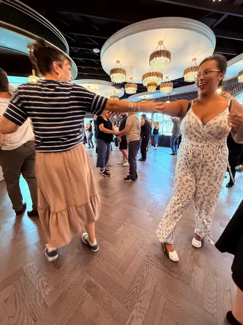 Friends dancing the sombrero at Tuesday Salsa Nights in Chilliwack