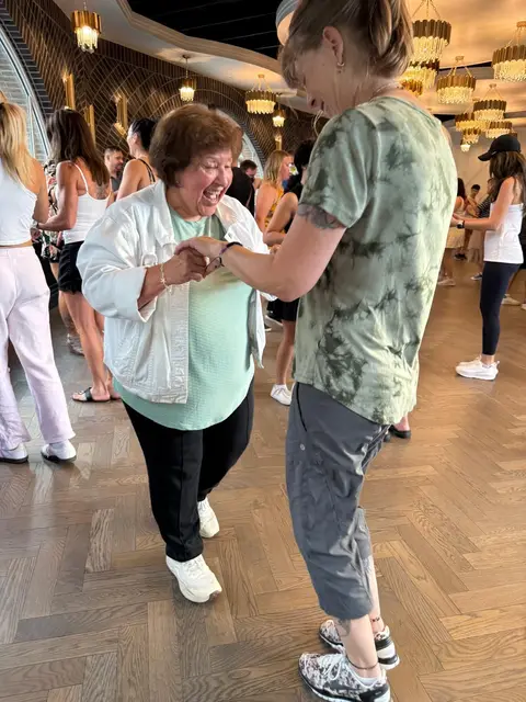 Laughing mid-dance at Tuesday Salsa Nights in Chilliwack, BC