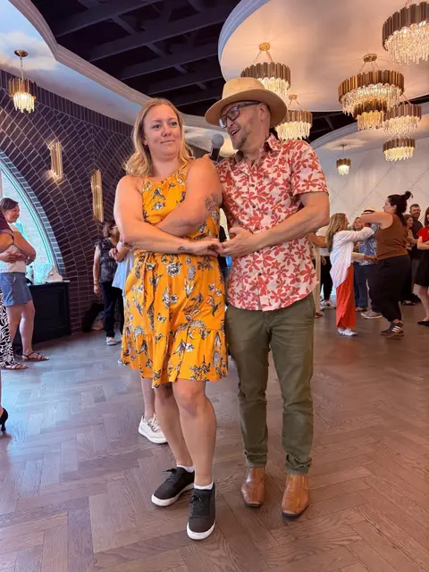 Salsa Paul leading a partner through the basic step at Tuesday Salsa Nights
