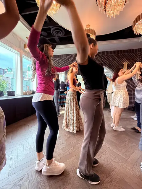 Dancers turning through the windmill at Tuesday Salsa Nights, The Grand Hall, Chilliwack