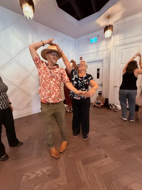 Salsa Paul leading the windmill at Tuesday Salsa Nights, The Grand Hall, Chilliwack