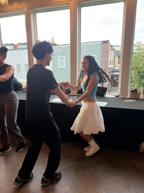 A couple dancing by the District 1881 windows at The Grand Hall