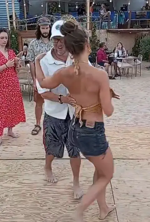 Latin dance lesson at La Tuna beach bar in La Ventana