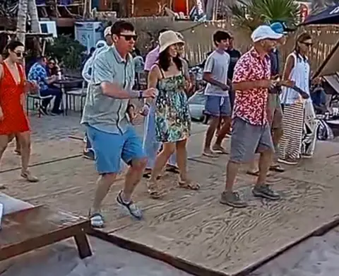 Salsa partner turn at the La Tuna beach stage
