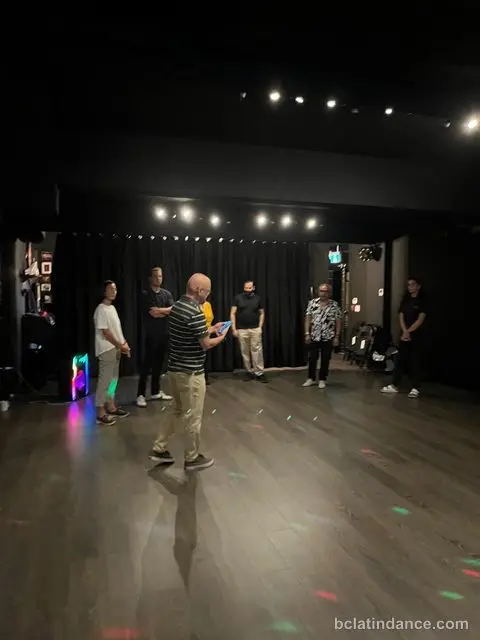 Salsa Paul opening the night as the class gathers along the curtain at Spencer Studios, Chilliwack